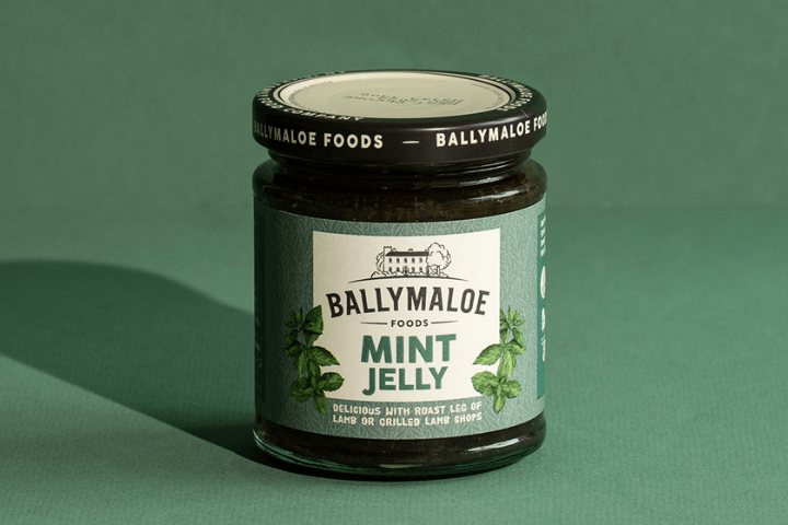 Refresh your palate with the delightful Ballymaloe Mint Jelly, featured in this website image. A jar filled with the cool and zesty essence of mint, the perfect companion to your favorite dishes.