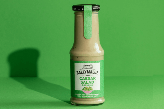 Add a touch of indulgence to your salads with Ballymaloe Caesar Dressing, highlighted in this website image. A jar filled with the classic creamy goodness and savory notes to elevate your dining experience.