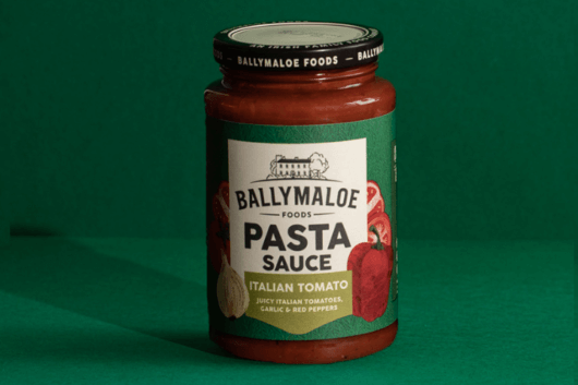 Savor the authentic taste of Italy with Ballymaloe Italian Tomato Pasta Sauce, showcased in this website image. A jar filled with the finest tomatoes and traditional flavors.