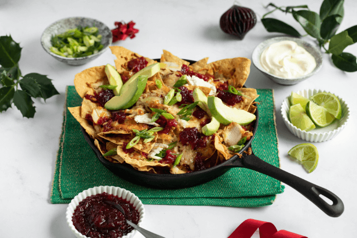 Mouthwatering shredded turkey nachos topped with Ballymaloe Cranberry Sauce, a perfect combination of tender turkey, crispy nacho chips, and sweet-tangy cranberry sauce